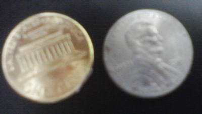 Gold and silver penny